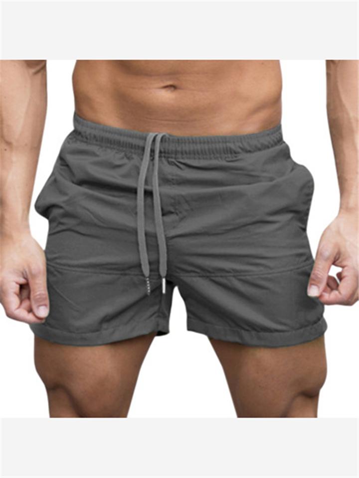 Solid Color Elastic Waist Shorts With Pockets For Men
